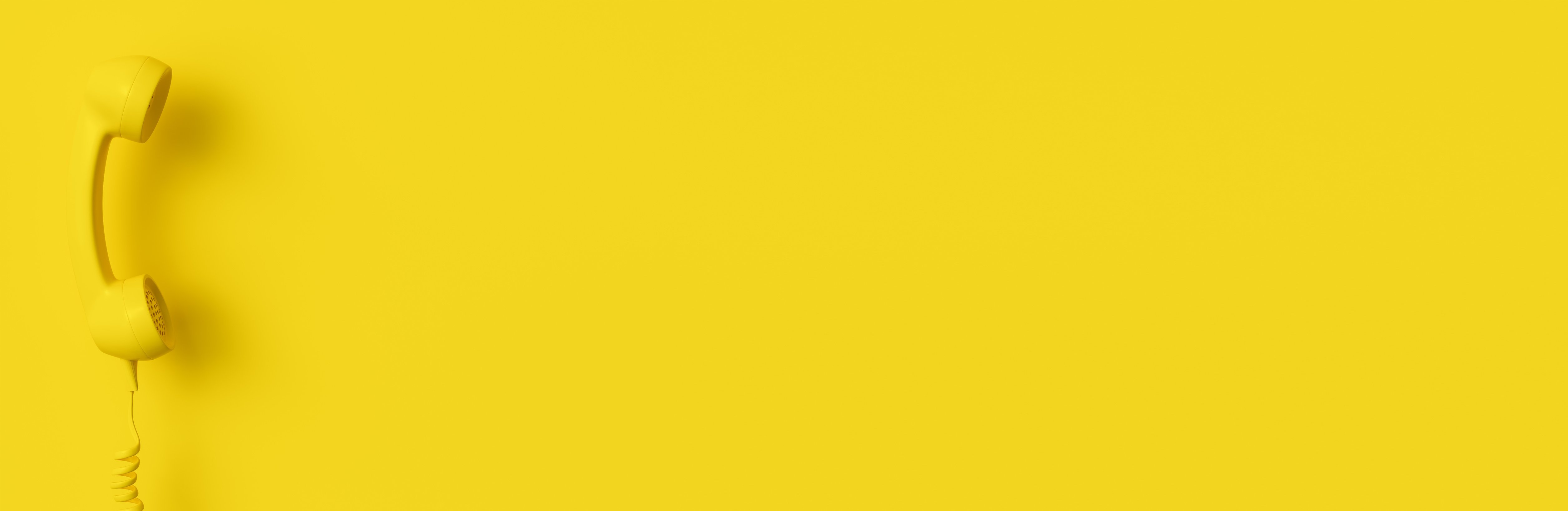 Monochrome Telephone Receiver on Yellow Banner Background